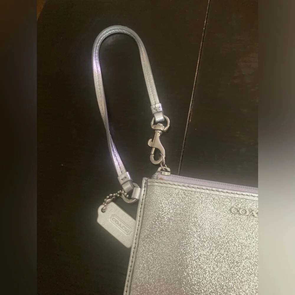 Coach Vintage glittery silver skinny zip wristlet wallet. Good used condition